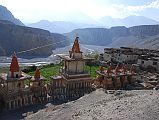 Mustang 01 04-2 Tange Chortens Tange is a small village dominated by a series of large chortens in a combination of bright red and white colours.